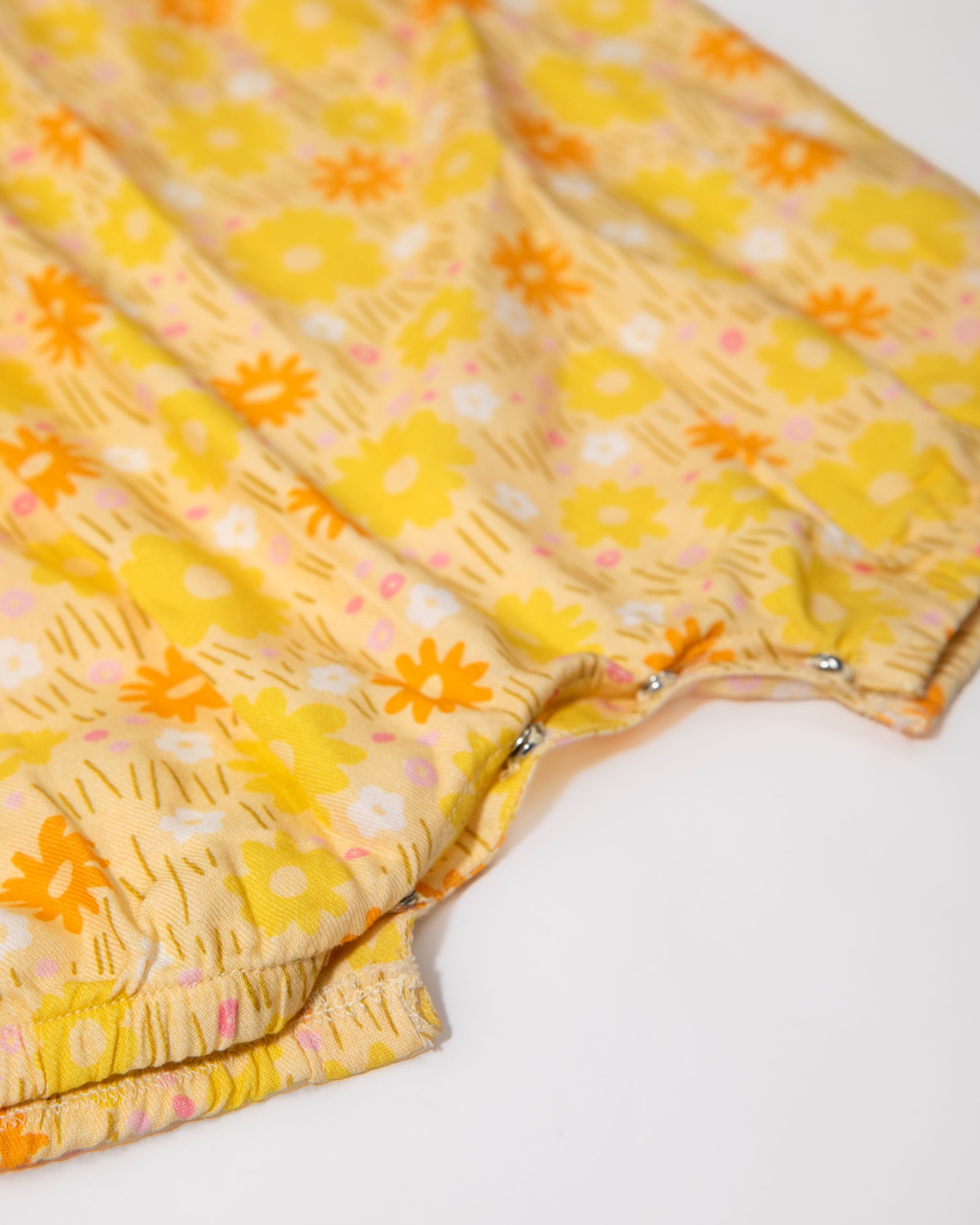 Bright Yellow Frill Bib Onesie